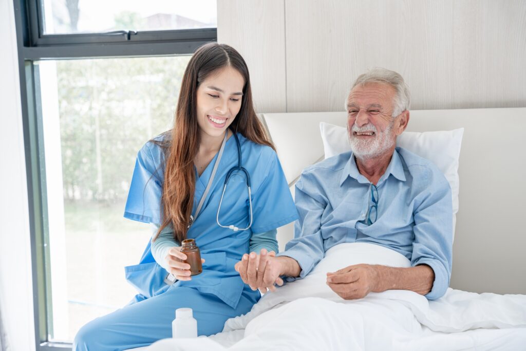 Nurse is attentively caring for the senior at the nursing home.